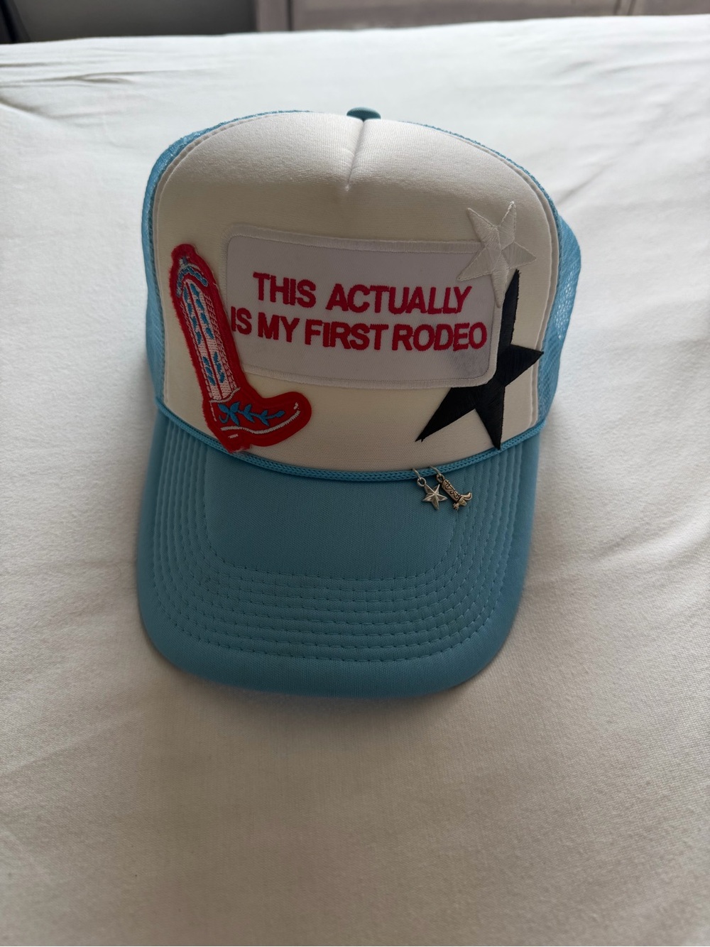 Blue & White Trucker Hat - "This Actually Is My First Rodeo"